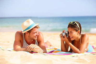 Cute-Couple-enjoying-on-the-Beach.jpg