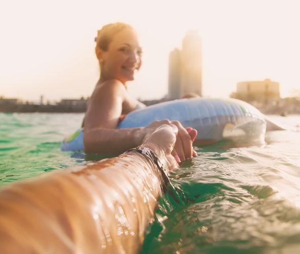 Woman-smiling-in-the-ocean-1212010.jpg