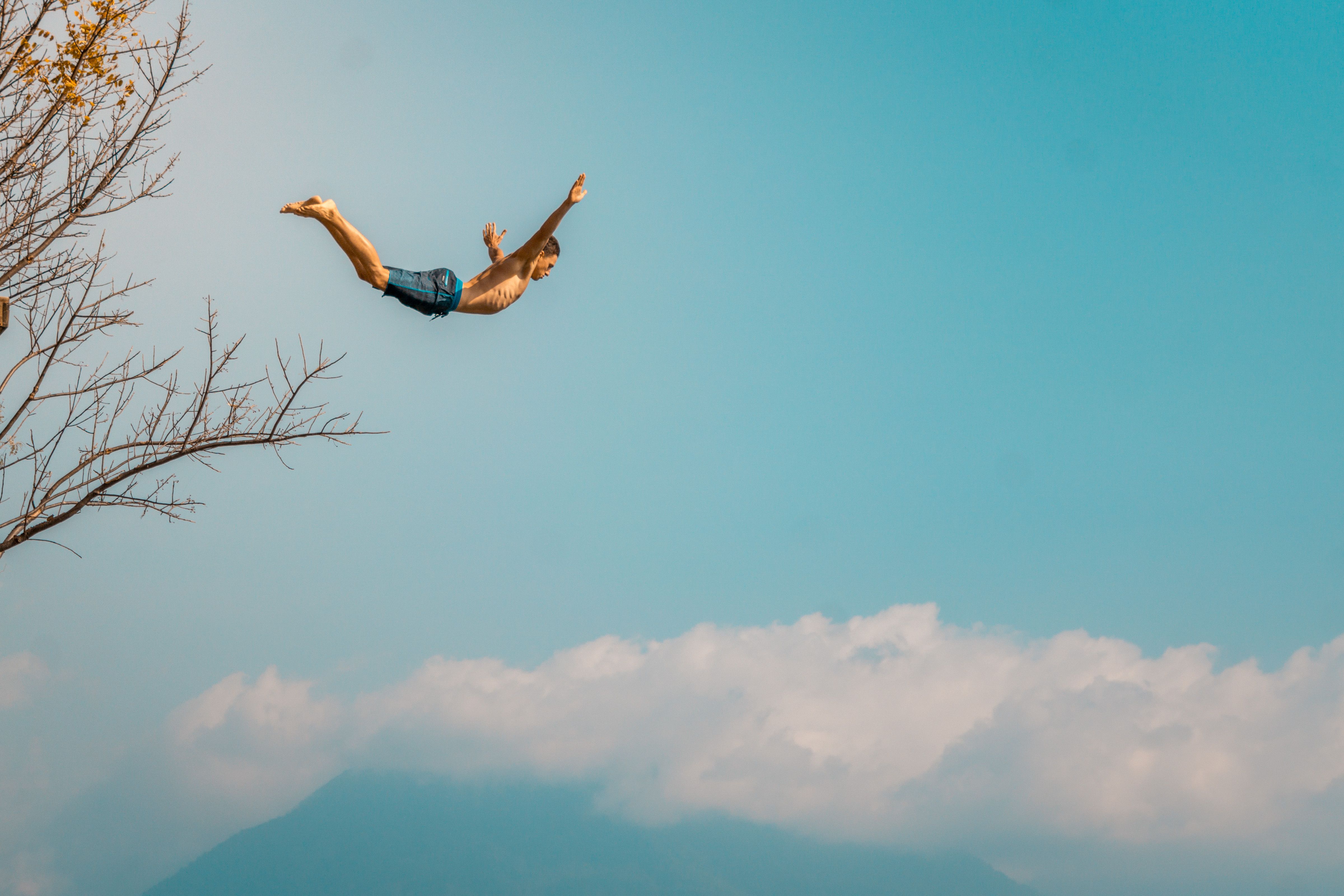 Cliff jumping San Marcos, lake Atitlan, Guatemala