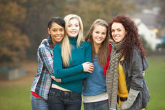 four-teenage-girls-autumn-landscape-13675717.jpg