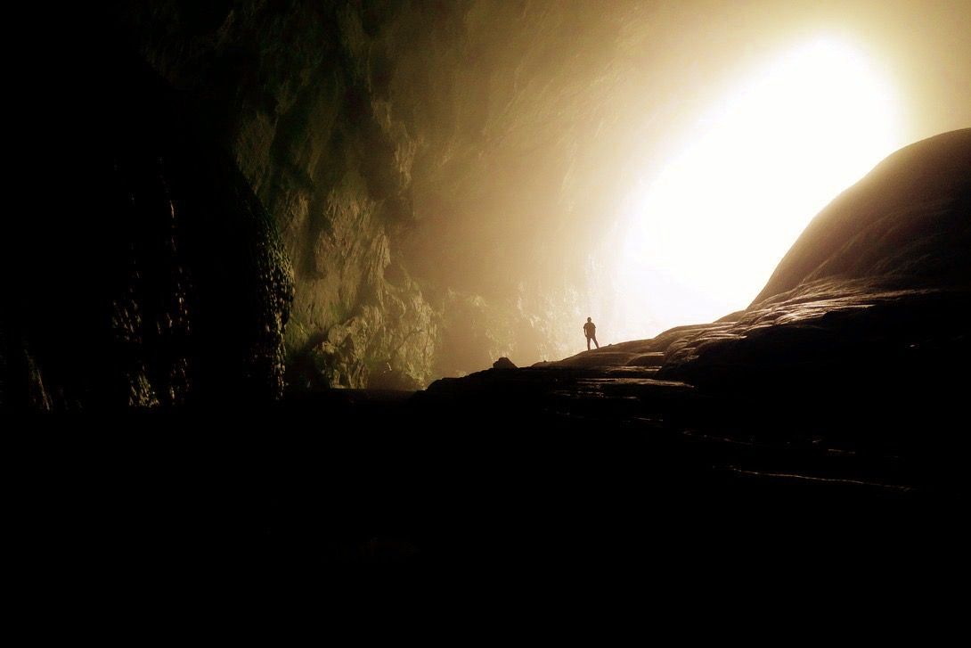 cave-massive-huge-light-tiny-person-freedomain-edited-bright-golden.jpg