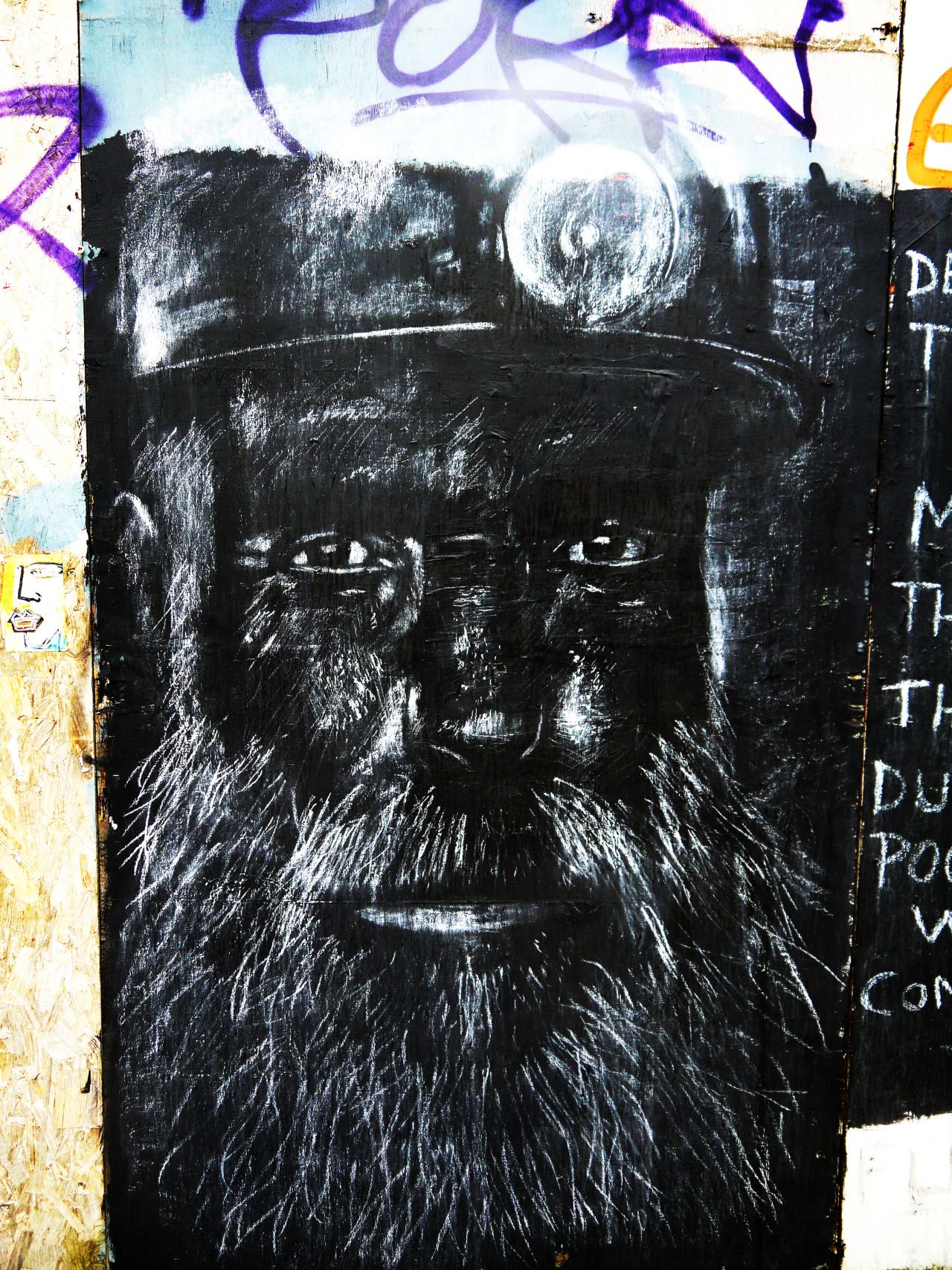 87008414031 - hackney wick street art miner portrait.jpg