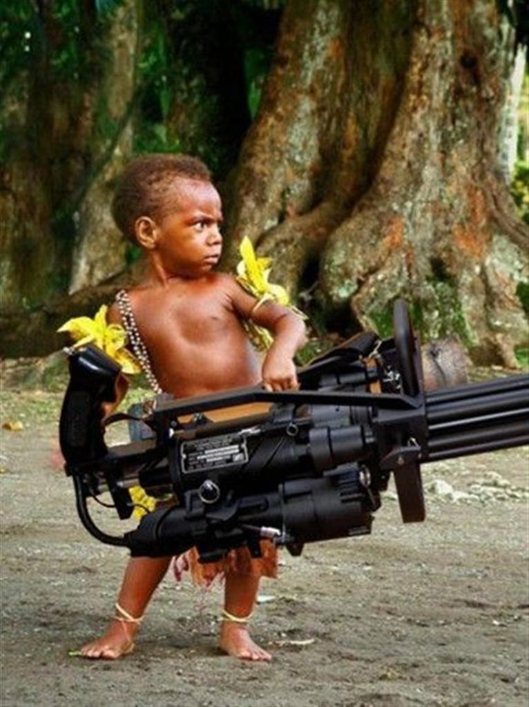 Funny-Dangerous-Kid-With-Big-Machine-Gun.jpg