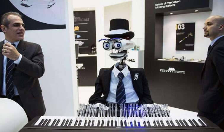 Teotronico, a robot with 19 fingers designed to play the piano, performs at the Hannover Messe industrial trade fair in Germany..jpg