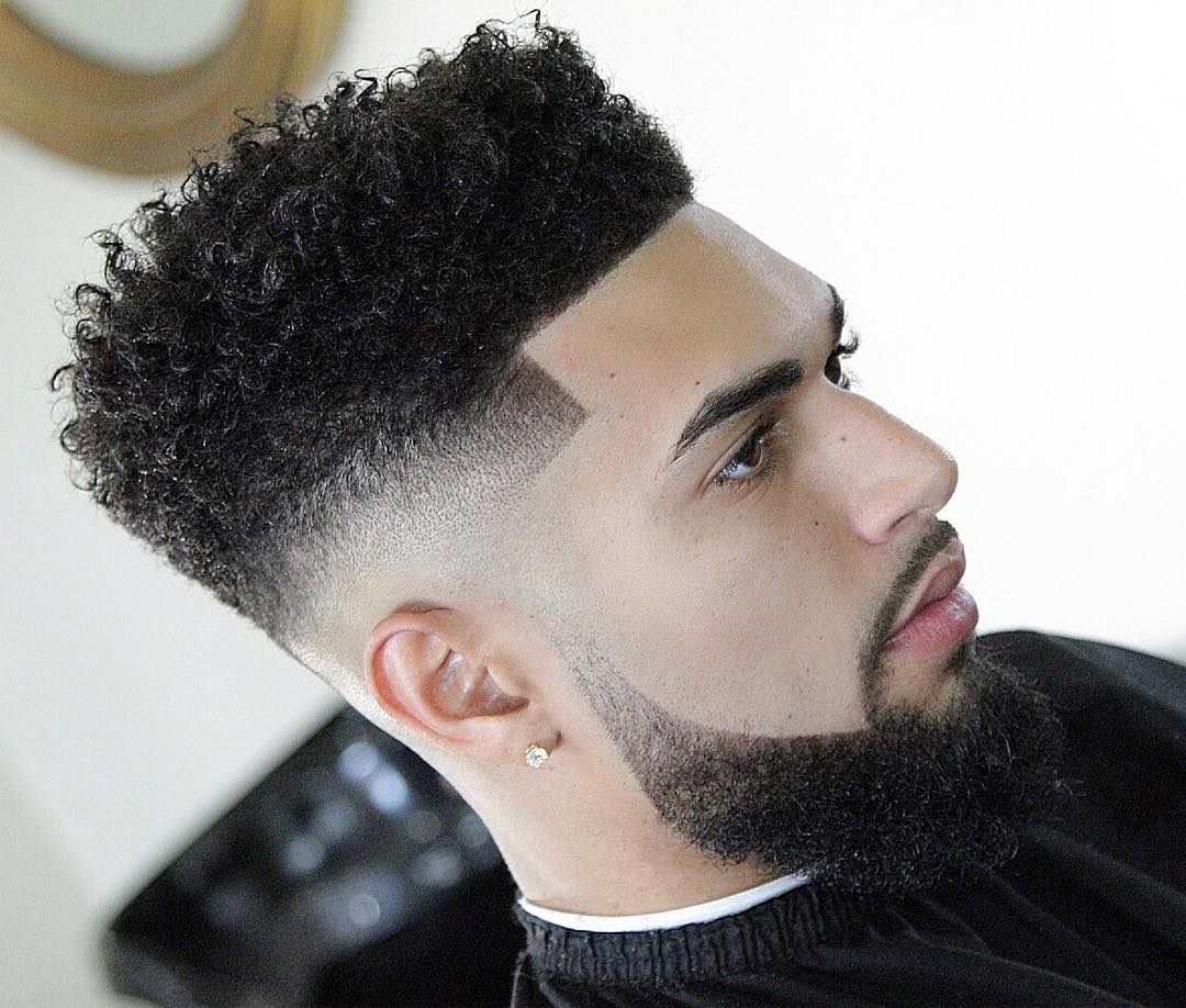 angel_raws-high-bald-fade-and-curly-hair-haircut-for-men.jpg