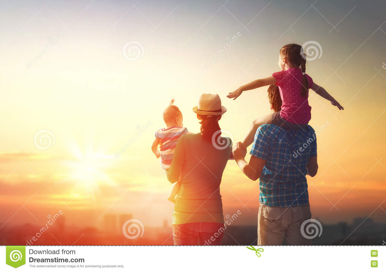 happy-family-sunset-father-mother-two-children-daughters-having-fun-playing-nature-child-sits-shoulders-70819678.jpg