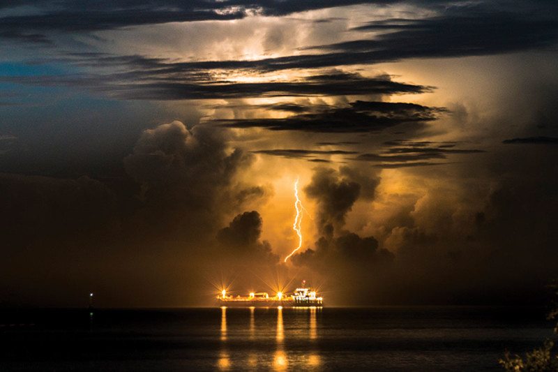 Awesome Pic Lightning storms triggered by exhaust from cargo ships.jpg