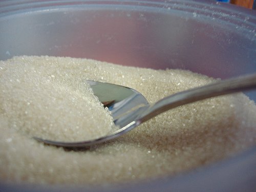 raw-sugar-in-bowl-with-spoon.jpg