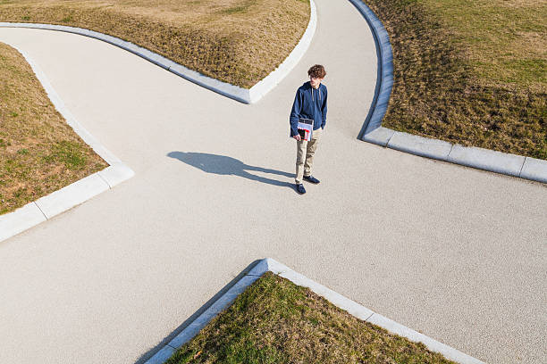 germabadenwurttemberg-teenage-boy-standing-at-crossing-picture-id500094285.jpg