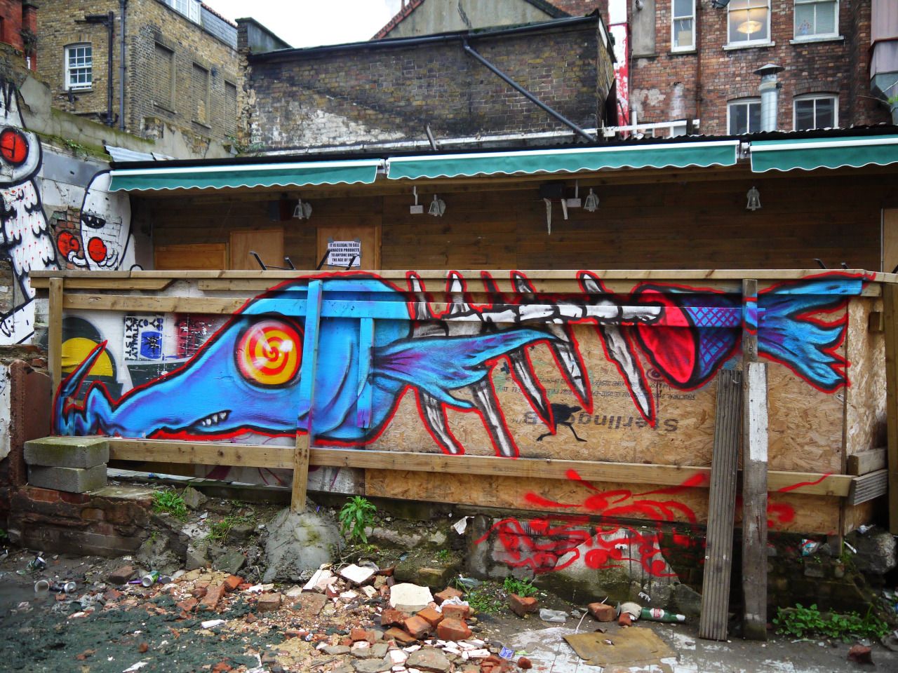 73217306464 - back yard street art brick lane.jpg