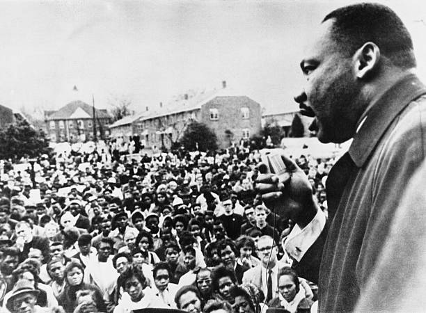 april-1965-dr-martin-luther-king-addresses-civil-rights-marchers-in-picture-id3142661.jpg