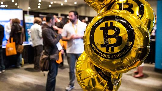 104492222-GettyImages-483236197-bitcoin.530x298.jpg
