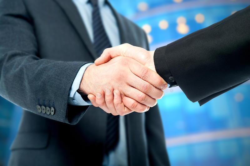 business-deal-finalized-congratulations-handshake-37361478.jpg