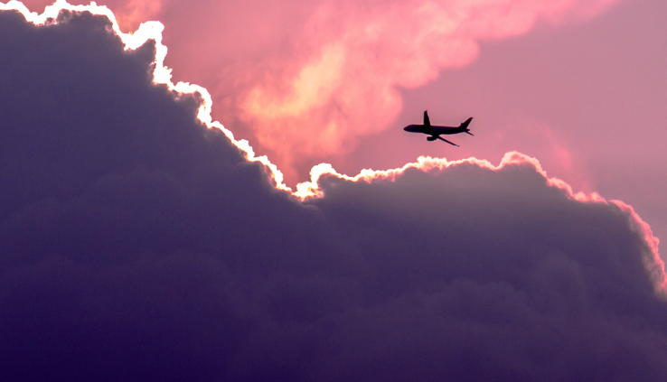 plane over clouds
