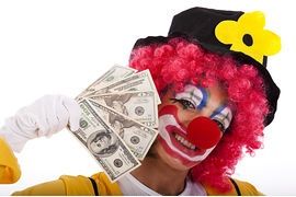 funny-clown-holding-money-funny-clown-showing-some-dollar-bills-isolated-on-whites-stock-photo_csp4674032.jpg