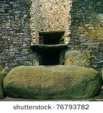 stock-photo-newgrange-entrance-with-view-of-the-famous-triple-spiral-and-diamonds-designs-a-world-heritage-76793782.jpg