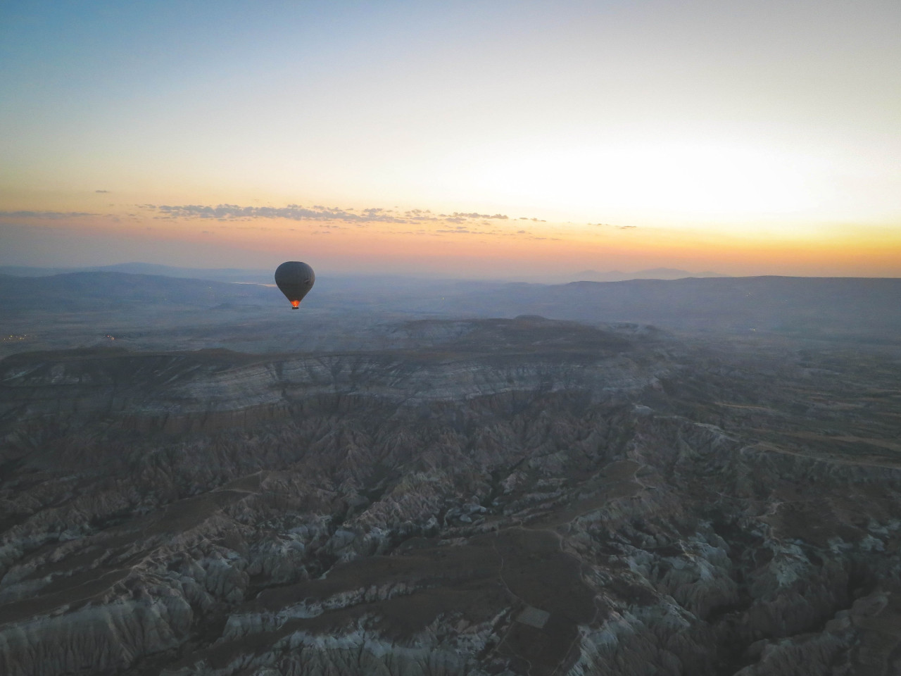 141.A magical moment, watching the first hot air balloon rise with the sun..jpg