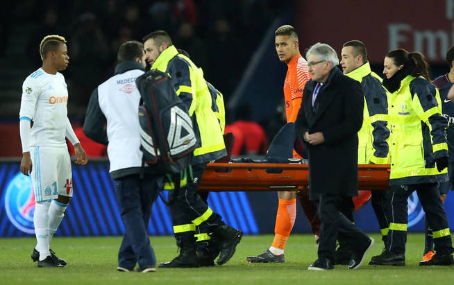 soccer-football-ligue-1-paris-st-germain-vs-olympique-de-marseille-parc-des-princes-paris-france-february-25-2018-paris-saint-germain-s-neymar-is-stretchered-off-the-pitch-after-sustaining-an-injury-reuters-stephane-mahe.jpg