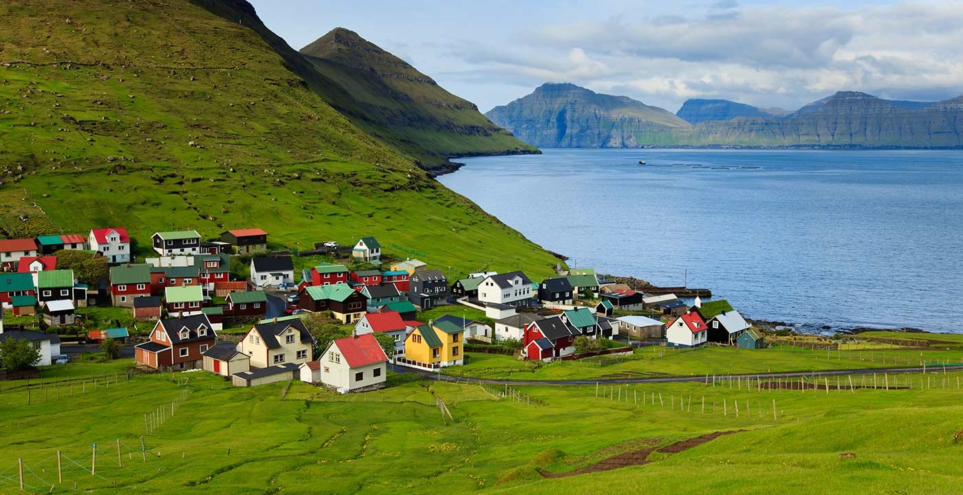 1400-Travel-World-Best-Places-Faroe-Islands-Village-Fjord.imgcache.rev68f9c5dfe5656484de4918b9494afcc1.web.jpg