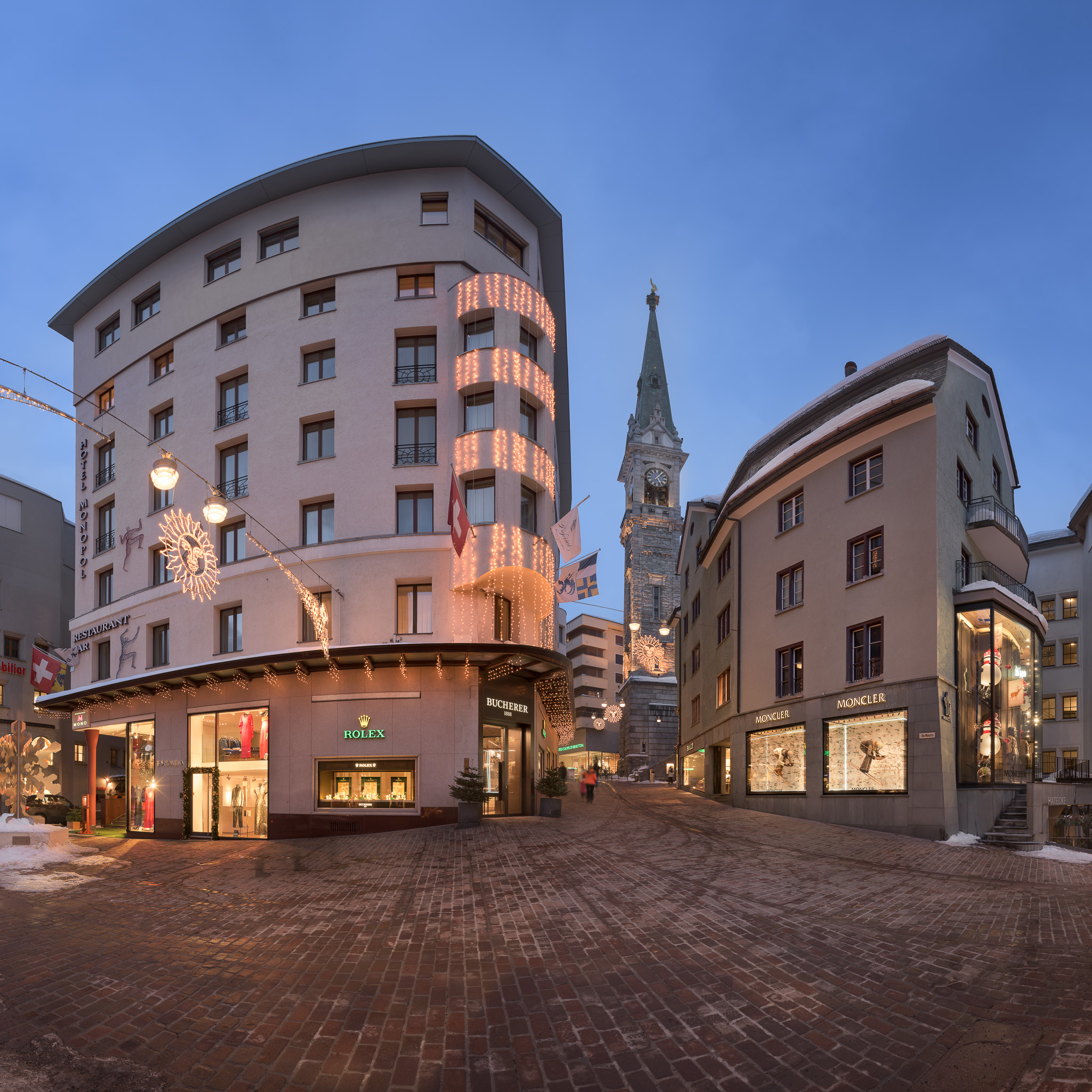 Panorama-of-Via-Maistra-and-Reformed-Church-St-Moritz-in-the-Evening-St-Moritz-Switzerland.jpg