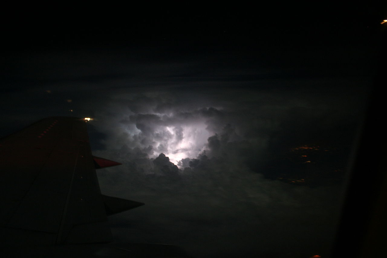 1280px-LightningAboveCloudsView.JPG