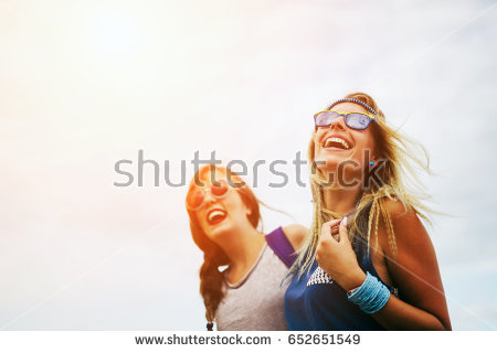 stock-photo-happy-friends-laughing-and-smiling-outdoors-652651549.jpg