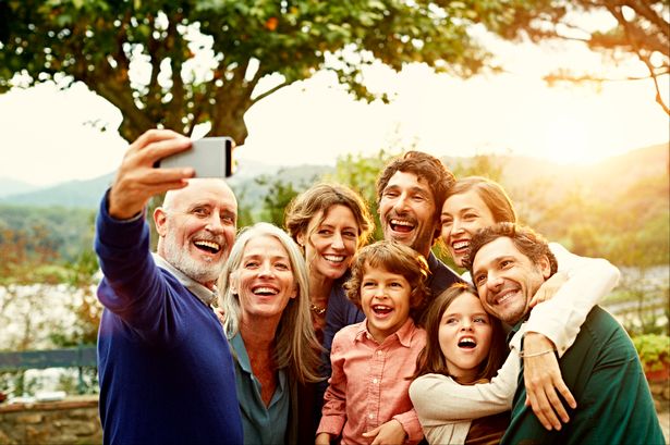 Cheerful-family-taking-selfie.jpg
