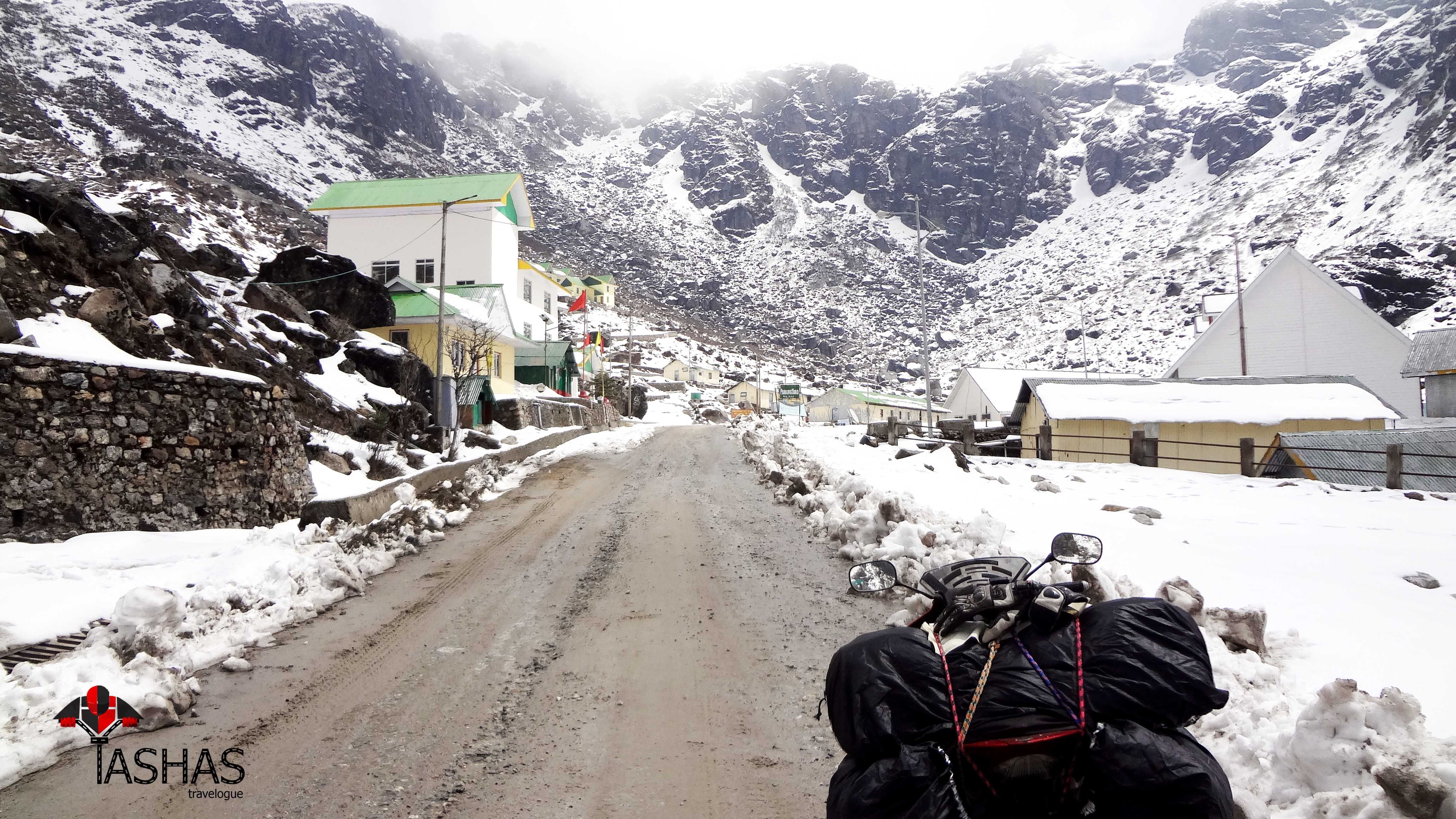 Snow covered path to nathu la.jpg