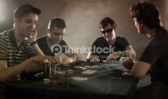 guys-playing-poker-picture-id119963680.jpg
