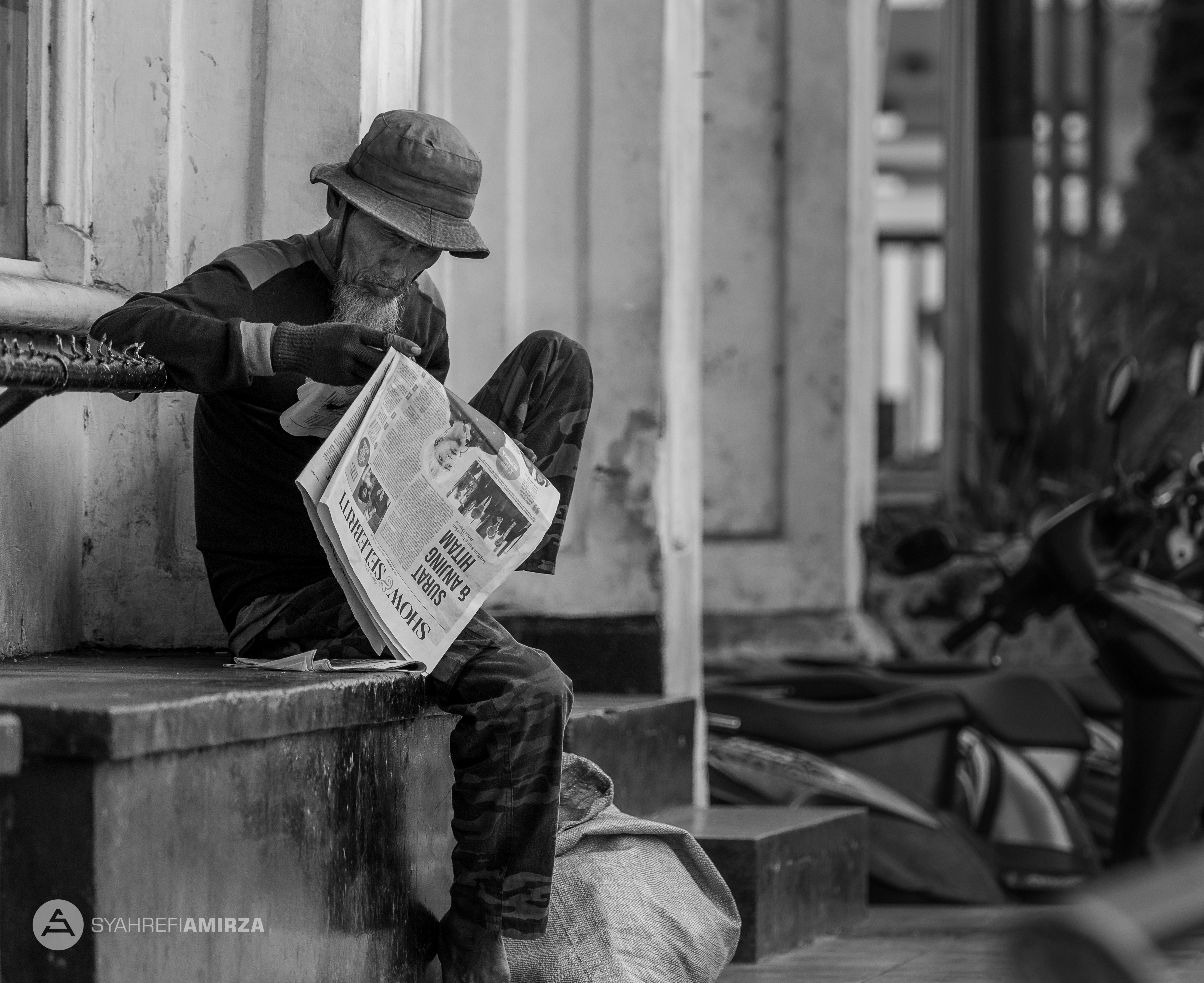 Elder Reading Newspaper Steemit
