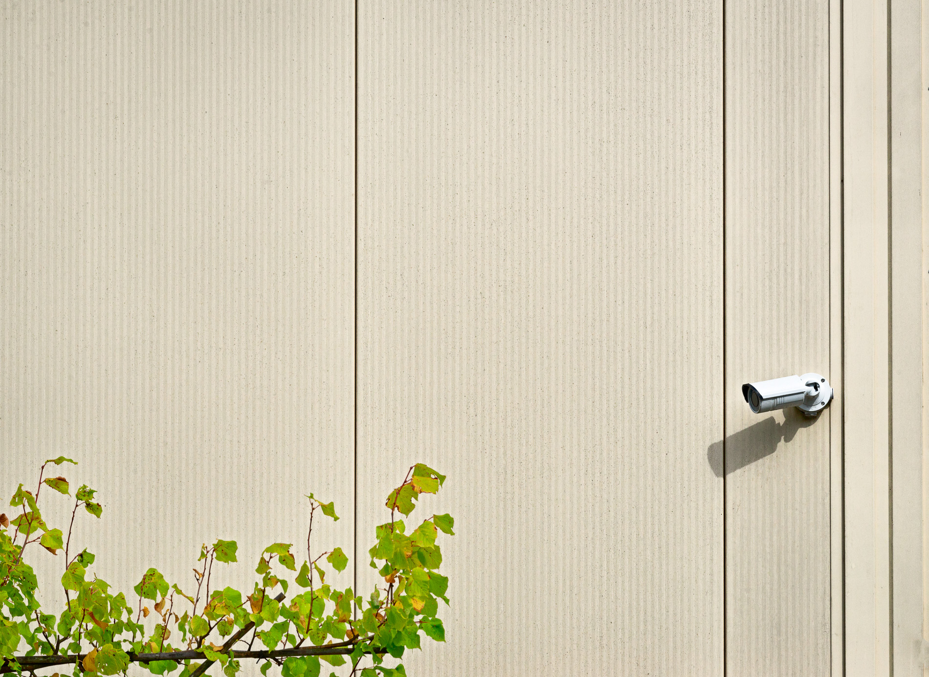 Facade with a surveillance camera