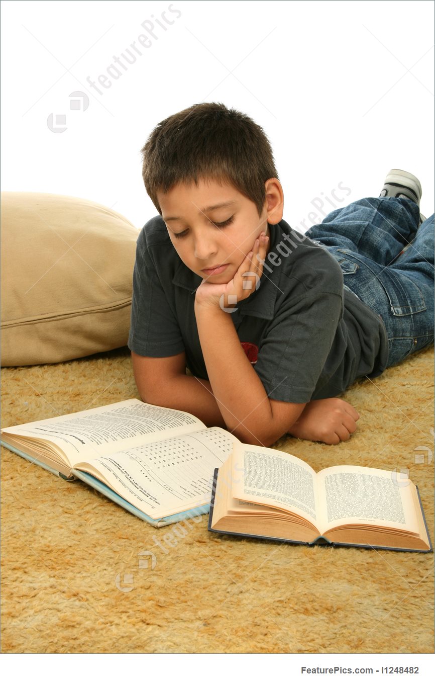boy-reading-books-on-the-floor-stock-picture-248482.jpg