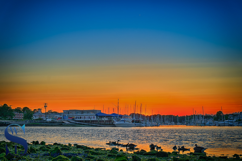 MIlford Yach club across the water at sunset.jpg