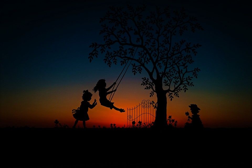 children swing at sunset.jpg