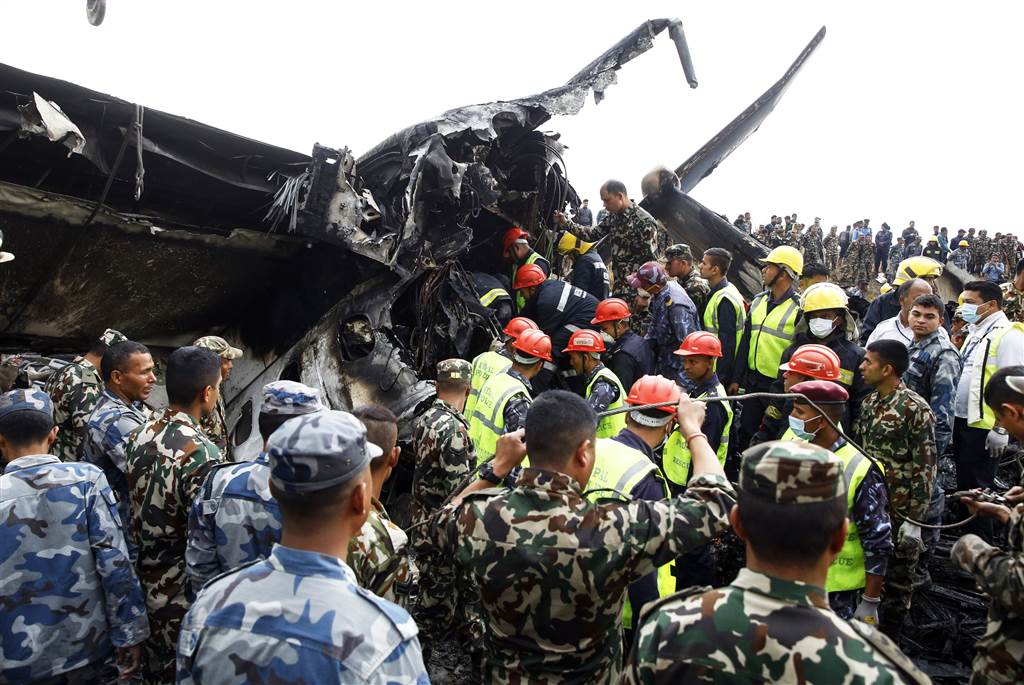 180312-nepal-plane-crash-2-al-1309_96d80a76659b1927b92b43964f3a8f40.nbcnews-ux-1024-900.jpg