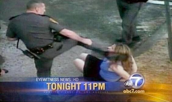 np punishment for kicking handcuffed woman.jpg