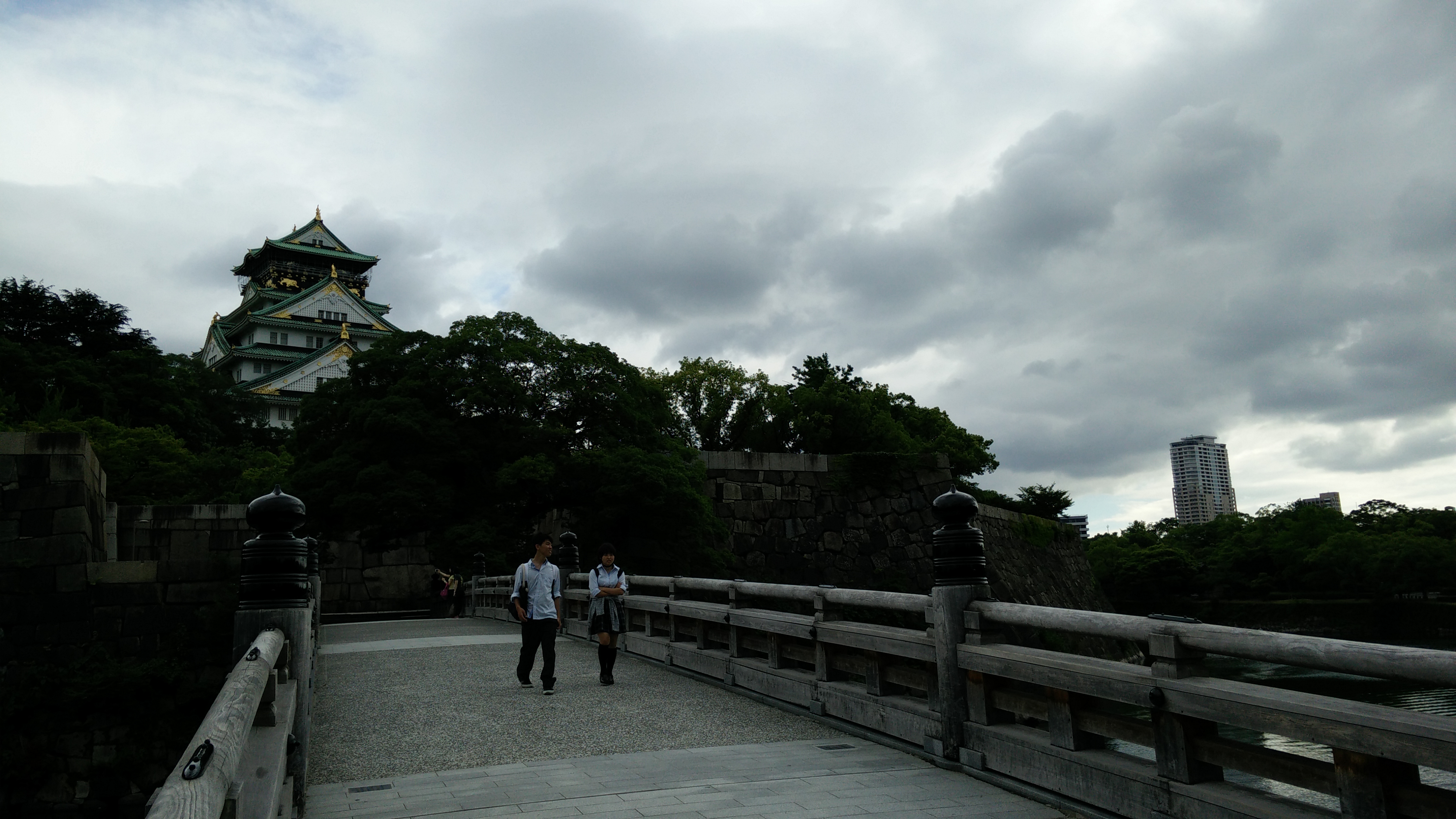 Wooden bridge with Osaka Castle