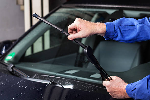 checking-the-windscreen-wiper-picture-id171587297.jpg