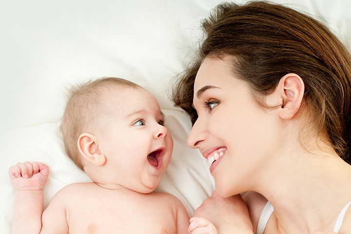 Happy-Mother-And-Happy-Baby-In-The-Bed.jpg