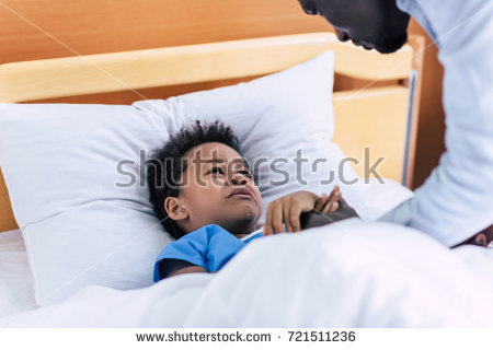 stock-photo-selective-focus-of-crying-african-american-boy-lying-in-bed-and-looking-at-father-in-hospital-721511236.jpg