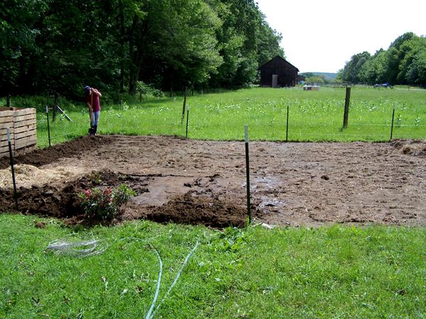 David digging trench for small garden fence crop June 2011.jpg