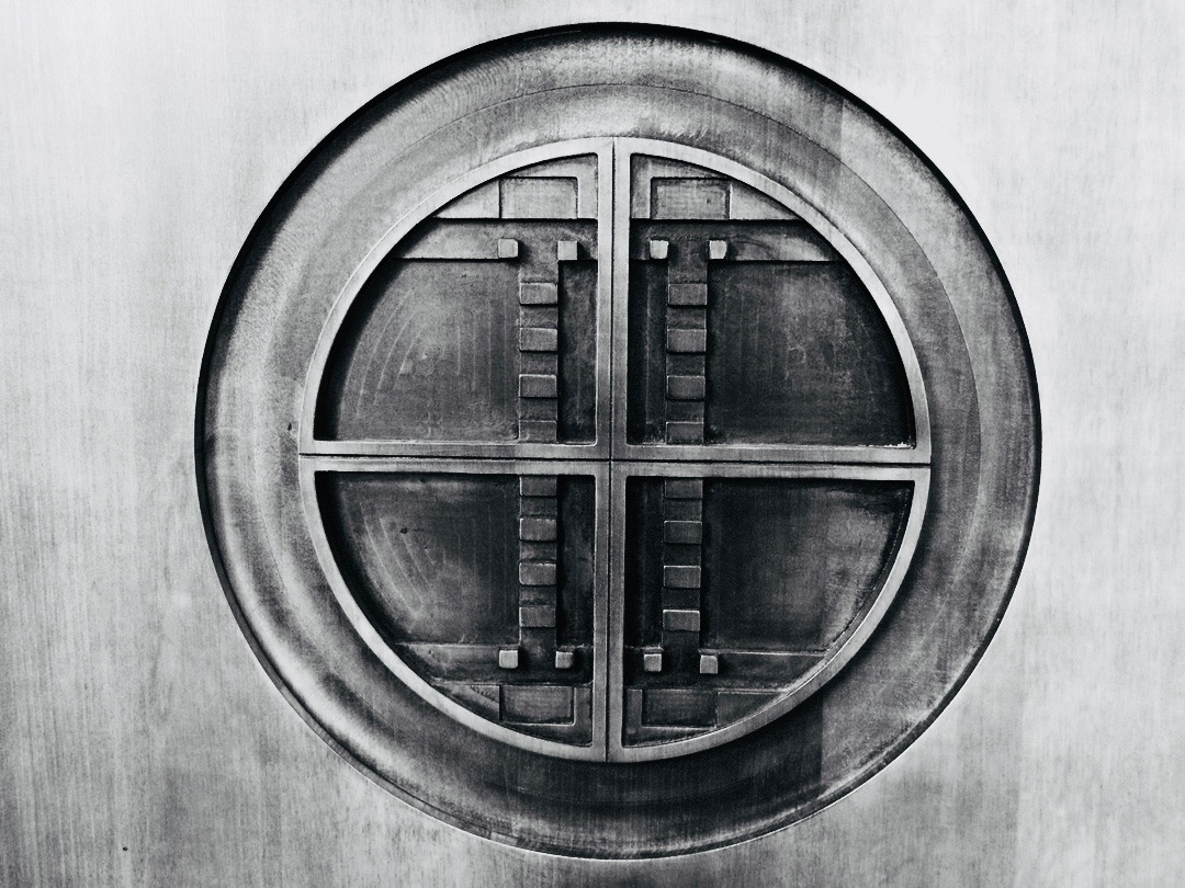 library-circle-cross-emblem.jpg