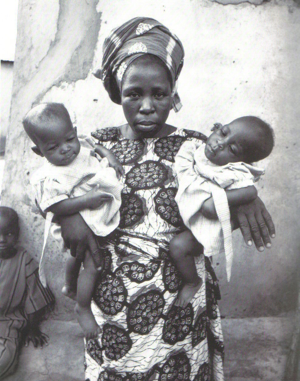 Yoruba_woman_holding_twins.jpg
