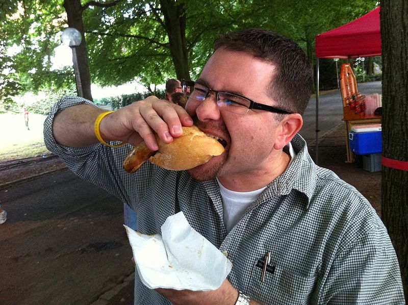 800px-Man_Eats_Meat_and_Bread.jpg