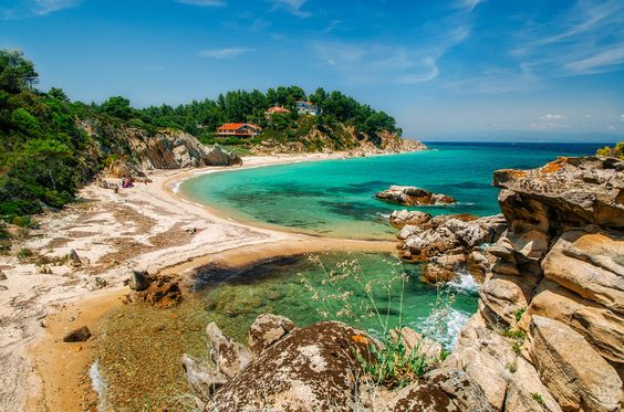 Wild beach in Vourvourou, Sithonia, Greece.jpg