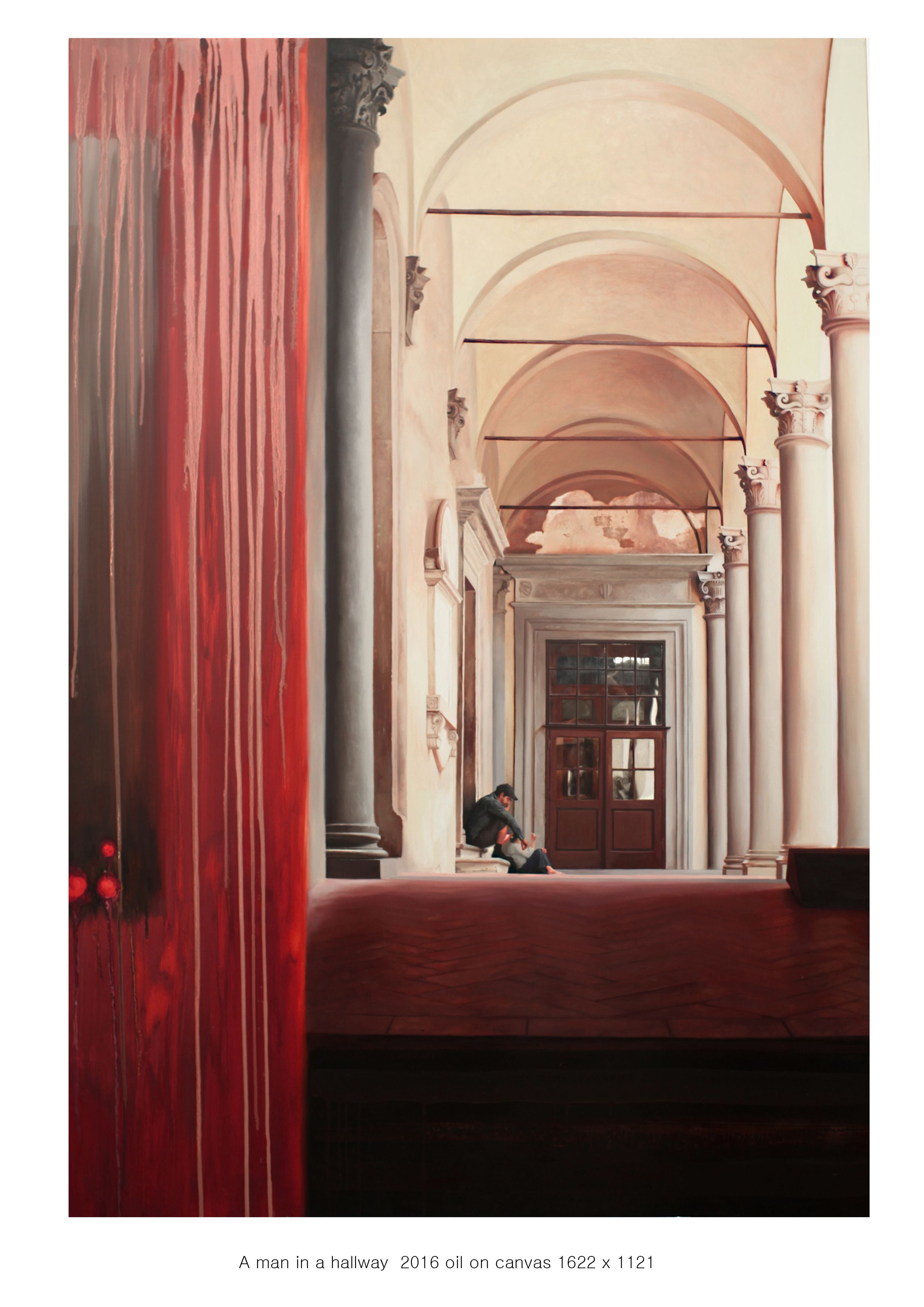 A man in a hallway.jpg