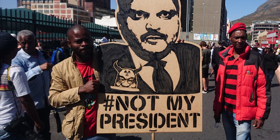 s3-news-tmp-116055-atul_gupta_protest_banner_-_cape_town_zuma_must_fall--2x1--940.jpg