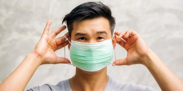 sisi-berwarna-hijau-atau-putih-bagaimana-cara-pakai-masker-yang-benar-1576202605.jpg