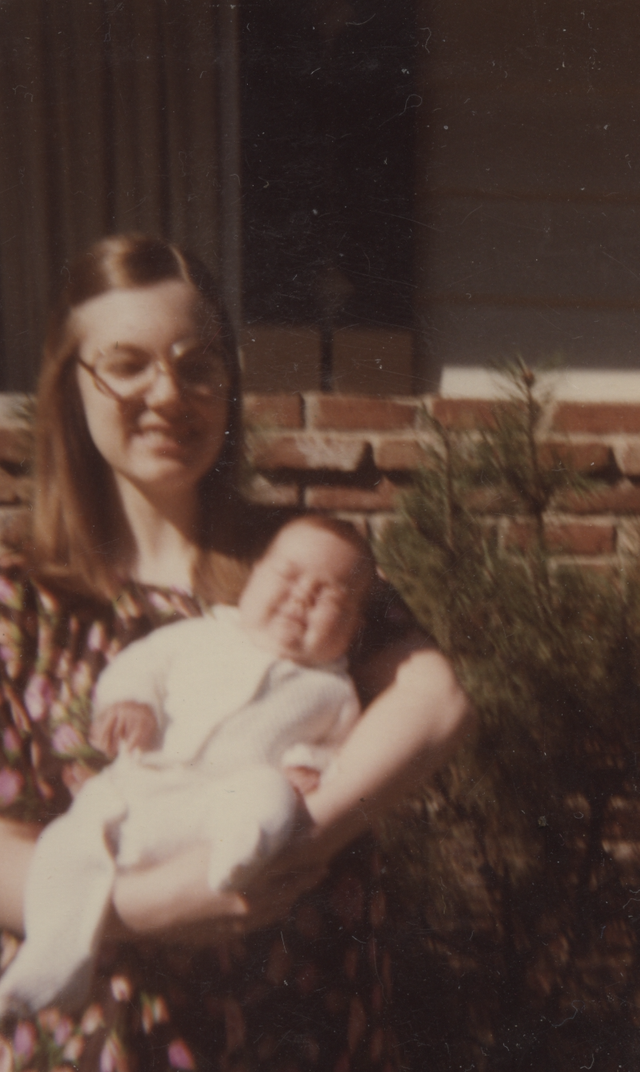1980 Marilyn Holding Katie Outside.png