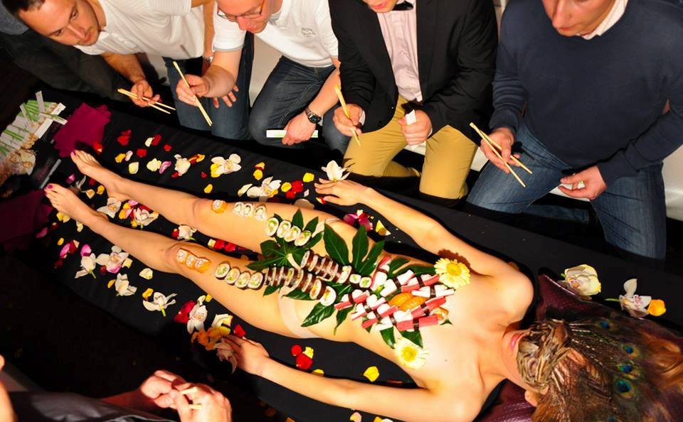 In traditional Nyotaimori, the model... 